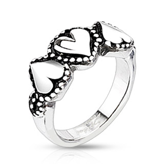 Bague femme acier � coeurs entour�s de pointillets