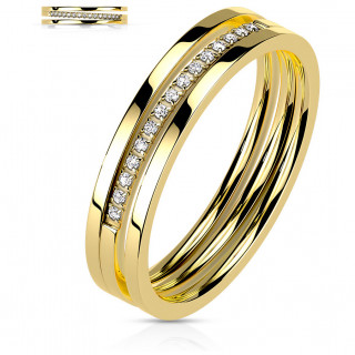 Bague femme en acier dor� � triple ligne dont une pav�e de zirconiums