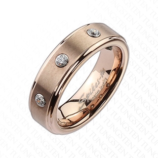 Bague femme tungstene cuivr�e � trois pierres claires