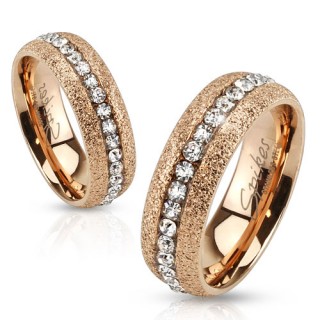 Bague mixte en acier cuivr� et sabl� avec coutours de pierres