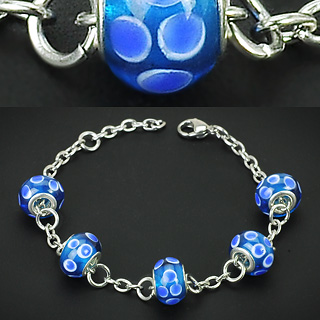 Bracelet acier et perles bleues style Murano