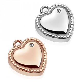 Pendentif coeur serti en acier � contours en pointillets